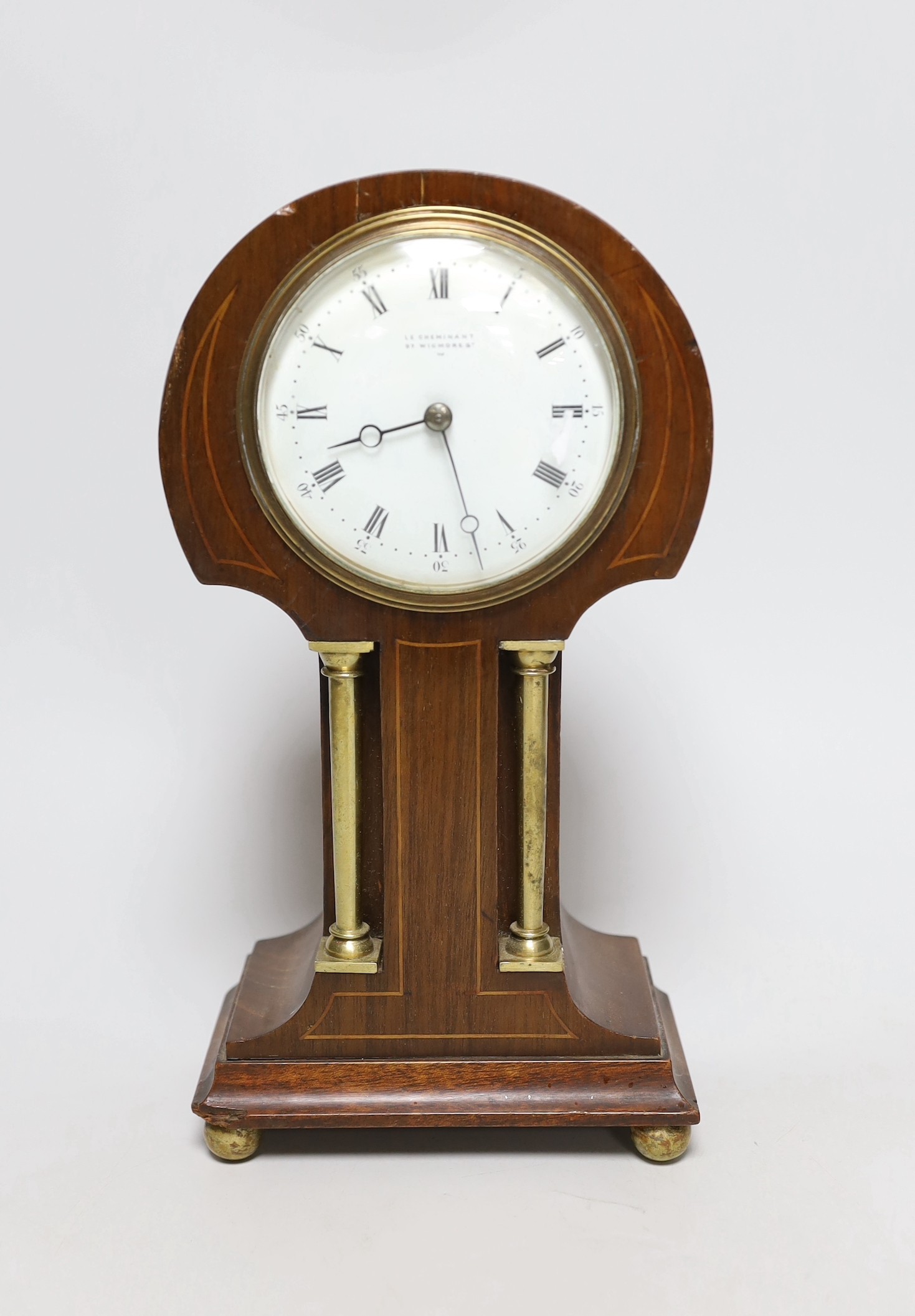 An Edwardian inlay mahogany timepiece, 26cms high